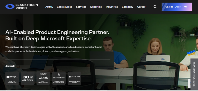 AI-enabled product engineering company team working in a modern office with expertise in Microsoft technologies and scalable software solutions
